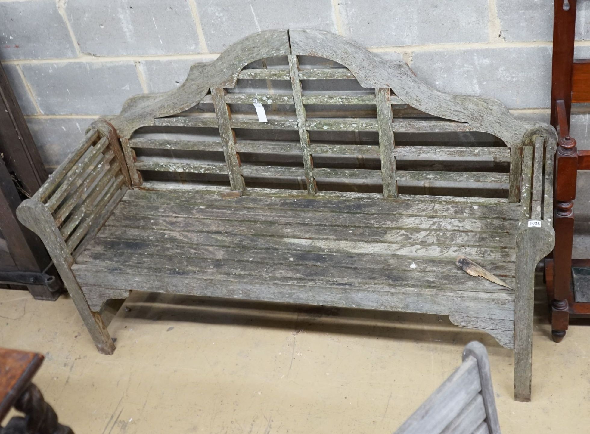 A Lutyens style teak garden bench, length 158cm, depth 51cm, height 98cm